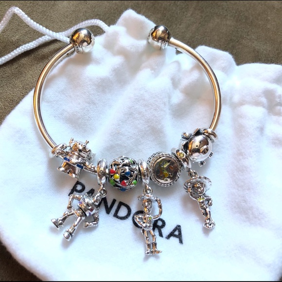 Pandora Jewelry - NWOT Pandora Bracelet & 7 Charms Toy Story Themed + 2 Stoppers